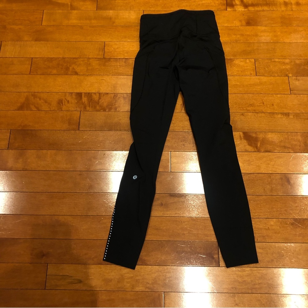 Lululemon fast and free leggings in black. Like new.